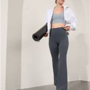 Athleta Salutation Stash flare Black Flare pant with Side Pocket